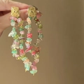 Close-up of bohemian long tassel earrings with multicolored stones and gold hammered metal - Bohemian Gold Irregular Stone Tassel (38# Silver Needle)