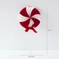 Kerst lolly decoratie in rood en wit met een rode fluwelen strik lengte van 43cm - 43cm Grote Windmolen Lolly