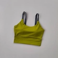 Detailed flat lay of avocado green high-impact sports bra with grey straps and wide hem - S / Olive/Dark Grey