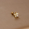 Macro shot of gold floral tragus stud with marquise cubic zirconia and screw ball back - Marquise Zirconia Flower / Gold