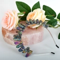 Detail of handmade blue crystal crown headpiece with wire wrapping on pink quartz - Multicolor Crystal