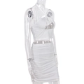 Detailed side view of white halter neck top and ruched bodycon skirt set on mannequin - S / White