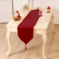 Deep red Christmas table runner with floral jacquard patterns and decorative tassels - 180x34cm / Red Christmas Flower Style