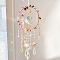 Macro detail of handmade crystal suncatcher with natural quartz stones and prisms - Colorful Fluorite