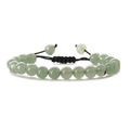 Close-up of 8mm light green natural stone beads on a black braided adjustable cord - Green Aventurine