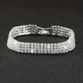 Luxuriöses silbernes Brautarmband mit vier Reihen funkelnder Strasssteine für formelle Anlässe - 4-reihiges Armband