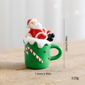 Mini Weihnachtsmann-Figur in grüner Tasse, 10cm Kunstharz-Weihnachtsdekoration - Weihnachtsmann Teetasse Ornament