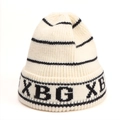 Detail of the knit texture and XBG letter embroidery on the off-white striped beanie - One Size (Elastic) / Black Letter