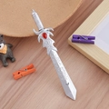 Silver vintage sword shaped pen with red gemstone detail on a wooden desk background - Demon Sword - Silver / 0.5mm