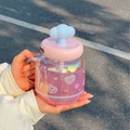 Pink gradient cloud glass cup with blue cloud lid and strawberry prints held in hands - 750ml / Pink