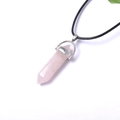 Detail of rose quartz hexagonal pendant with silver clasp and black cord necklace - Rose Quartz