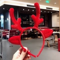 Festive red plush reindeer antler headband with glitter accents for Christmas party - Red Antlers with Ears