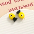 Close-up of cute yellow fish glass beads for DIY jewelry making with gold rings - 3D Color Matching Fish / Bright Yellow and Black