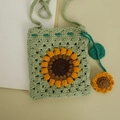 Handmade crochet sunflower crossbody bag in sage green with floral bag charm - Matcha Green Sunflower Crossbody