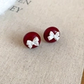 Detailed close-up of red round acrylic stud earrings with white 3D bow decoration - 18# Bowknot Red Ball Silver Earring Post Studs (HE29310) / Red/White