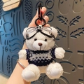 White pilot plush bear keychain with black goggles and blue knit sweater on a clip - Navy White Pattern Plush Bear
