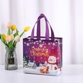 Purple non-woven Christmas gift bag with Santa Claus and reindeer graphics - Purple Christmas Snowman