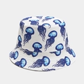 Reversible bucket hat in white featuring blue jellyfish prints for sun protection - White Blue Jellyfish