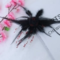 Gothic Halloween hair clip featuring black roses, feathers, and skeletal hand with blood detail - Lace Feather Skeleton Hand Hairpin