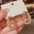Twisted gold hoop earrings with sparkling zircon inlay and S925 silver needles - Twisted Rope Inlaid Rhinestone Style (E1855 Gold) / 925 Silver Needle / Gold
