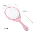 Specchio a mano vintage rosa con motivi a rilievo e manico elegante lungo 25 cm - Rosa