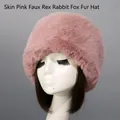 Detail of pink faux fur winter hat with thick plush texture on a display model - Leather Pink Faux Rex Rabbit Fox