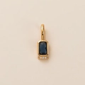 Detail of a gold pendant with a square dark blue gemstone and three round clear stones - Pendant Only / December (Zircon Color)
