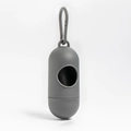Gray capsule-shaped dog waste bag dispenser with portable carabiner hook - Pill Dispenser Gray