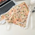 Orange floral cotton triangle headscarf with white lace trim and 100% cotton label - Daisy Orange Base