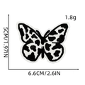 Leopard print butterfly embroidery patch in black and white with 6.6cm x 5cm dimensions - Cow Print Butterfly