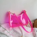 Neon pink transparent PVC jelly baguette bag on white silk with elegant props - Pink