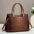 Elegant dark brown crocodile pattern tote bag with gold hardware and shoulder strap - Coffee Brown