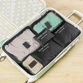 6-piece black waterproof travel luggage organizer set with mesh panels in a suitcase - Black