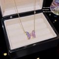 Elegant gold titanium necklace featuring a vibrant purple iridescent butterfly pendant - X673 Phantom Purple Butterfly