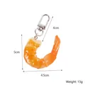 Realistischer PVC-Garnelen-Schlüsselanhänger mit Metallclip, Länge ca. 5 cm - Geschmortes Garnelenfleisch - Mit Schnalle