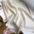 Elegant beige silk wool blend scarf with subtle metallic glitter trim for women - Cream