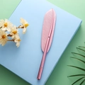 Creative rose gold metal feather ballpoint pen on a stylish mint green display background - 0.5mm / Pink