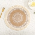Detailed top view of round jute placemat with white mandala pattern and cotton tassels - White Tassel Pattern 1