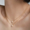 Double-layered gold necklace featuring pear-shaped zircon pendants in a stacked design - Water Drop Oval Pendant Double Layer / Gold
