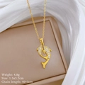 Détail du pendentif dauphin avec spécifications : poids 4,8g et taille 1,5x3,2cm sur l'image - Style de Dauphin Doré (H454)