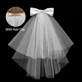 Short white double-layered bridal veil with satin bow, pearls and metal hair clip - Large Butterfly Pearl / White Pearl Hair Clip