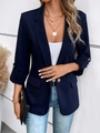 Detail of dark blue blazer featuring notched lapels, flap pockets, and gold sleeve buttons - S / Navy Blue