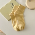 Zartgelbe Makronen-Baumwollsocken mit Rippenstruktur und Hello-Print für Damen - Milchiges Gelb