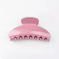 Glossy lotus pink resin hair claw clip with minimalist curved teeth design for women - Pink