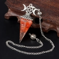 Pendel ketting met drie maan fasen, oranje harssteen en metalen spiraal detail - Rode agaat
