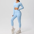 Detail of light blue yoga set featuring a functional side pocket on high-waist leggings - Sky Blue