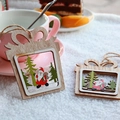 Wooden Christmas gift box pendant with laser-cut Santa and pine tree motifs - Gift Box Pendant