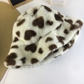 Detailed view of soft plush faux fur texture with heart leopard print on winter bucket hat - M (56-58cm) / Coffee Heart