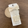Set of 4 beige lace hair clips featuring cute bows and flowers for babies and girls - Style 5