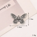 Macro shot of silver butterfly pendant with detailed engravings and size measurements - C370 28mm*19mm Vintage Silver Butterfly